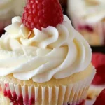 Almond Wedding Cake Cupcakes with Raspberry Filling